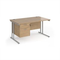 Click to view product details and reviews for Maestro 25 Straight Desk 1400mm X 800mm With 2 Drawer Pedestal Silver Cantilever Leg Frame Kendal Oak Top. Click to view product details and reviews for Maestro 25 Straight Desk 1400mm X 800mm With 2 Drawer Pedestal Silver Cantilever Leg Frame Kendal Oak Top.