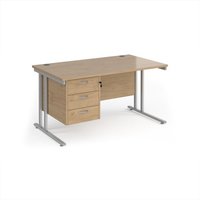 Click to view product details and reviews for Maestro 25 Straight Desk 1400mm X 800mm With 3 Drawer Pedestal Silver Cantilever Leg Frame Kendal Oak Top. Click to view product details and reviews for Maestro 25 Straight Desk 1400mm X 800mm With 3 Drawer Pedestal Silver Cantilever Leg Frame Kendal Oak Top.