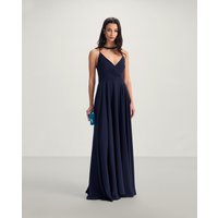 Veneno en la piel - Vestido largo en crepe con falda maxi y bolsillos laterales.