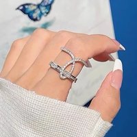 Cao Shi's Small Fragrance Cross Ring for Japanese Korean trendsetters, with a simple and elegant geometric design. New