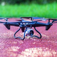 Puestos callejeros de juguetes inteligentes, drones, fotografía aérea, aviones teledirigidos, cuadricópteros, juguetes y regalos para niños.