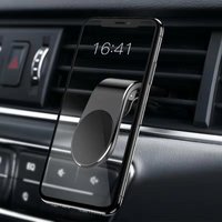 Creative clip style air outlet holder strong magnetic suction car phone navigation shock absorbing bracket