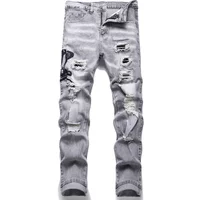 Men's Light Blue Ripped Skinny Serpentine Pattern Jeans Low Waist Slim Fit European Style Trendy Embroidered Long Trousers High Street Fashion