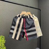 Marca de moda de ropa para hombres, pantalones cortos populares para hombres en verano, nuevos pantalones cortos de secado rápido, pantalones de