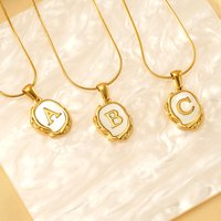Women’s Jewelry – Elegant Titanium Steel Shell Letter Pendant Necklace With 18K Gold Plated Lava Design, Minimalist Style For Everyday Wear