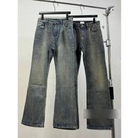 Haute Couture Inspired Bootcut Jeans – Vintage Mud Dyed Slub Texture & Artisan Distressing High Low Hem Runway Ready Silhouette