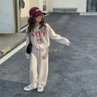 Girls' loose casual sweater with playful letters irregular long sleeved top T straight tube wide leg pants two-piece