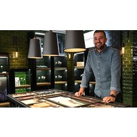 Image of Watch Building Experience with Refreshments and Snacks for One at Kartel