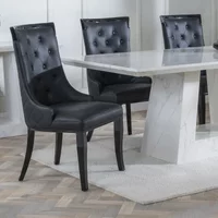 Click to view product details and reviews for Carmela Dining Chair Large High Back Black Leather Black Legs. Click to view product details and reviews for Carmela Dining Chair Large High Back Black Leather Black Legs.