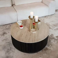 View Hampton travertine beige top round coffee table with black fluted base View Hampton travertine beige top round coffee table with black fluted base