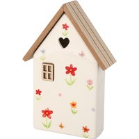 Deko-Haus mit Blumen