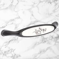 Poignée meuble 128 mm zamak finition laiton foncé porcelaine céramique fleur