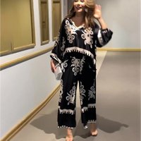 Clothing irregular printed long sleeved tops trousers two piece set