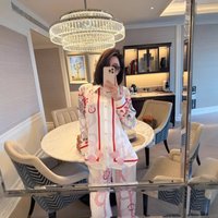 Elegant Printed Satin Loungewear Set Long Sleeve Shirt Wide Leg Pants Sophisticated Two Piece Ensemble