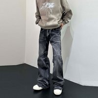Vintage Patchwork Jeans – Retro Washed Denim With Flared Hem (Unisex, Black)