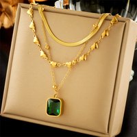 European and American fashion multi-layered mix and match stacked love snake bone chain emerald diamond cube pendant advanced versatile necklace