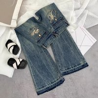 Women's Vintage Low-Rise Flared Jeans Retro Blue Distressed High-Waisted Stretch Denim Pants with Embroidery