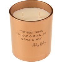 Candela profumata in bicchiere con citazione Audrey Hepburn
