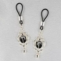 Sylvie Monthulé | Zilveren Tepelklem en Sieraad | Sacred Scarabs