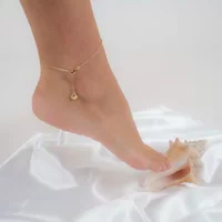 Sylvie Monthulé | Goud Enkelbandje | Ocean Shell