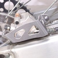 Image of 25-033 - Works Connection Rear Brake Caliper Guard For Yamaha YZ 125/250 2006-2021, YZF 250/450 2006-2020, YZF250X 2015-2021, YZF450X 2016-2020, WRF250 2006-2023, WRF450 2006-2025