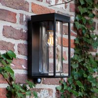 LUTEC FLAIR solar-powered outdoor wall light, black, 29 cm, sensor, IP44
