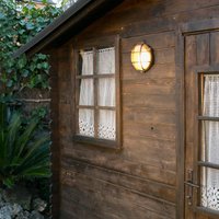 FARO BARCELONA Utomhusvägglampa Noray, mässing, Ø 19 cm, IP44