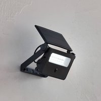 Lindby LED solar wall light Rikard, black, stainless steel