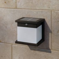 Philips Diara LED solar wall light, black, with sensor, IP44