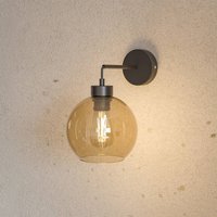 TK Lighting Vägglampa Cubus, svart/bärnstensfärgad, glas, Ø 18 cm, E27