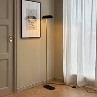 Dyberg Larsen Arch floor lamp, black/brass, 143 cm