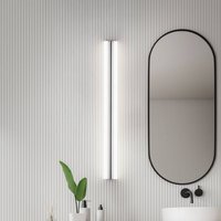 Helestra LED mirror lamp LOOM, length 90 cm, chrome, IP44
