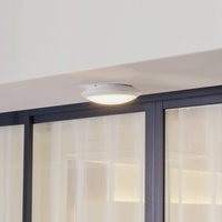 Lindby Naira LED outdoor ceiling lamp, white, sensor, 30 cm, IP65