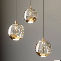 Lucande LED-pendellampa Hayley, Ø 25 cm, 3 lampor, guld, glas
