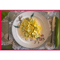 Dining experience at a local's home in Parma with show cooking