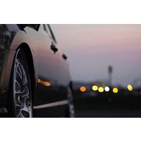 Full day luxury car with driver at disposal in Zurich