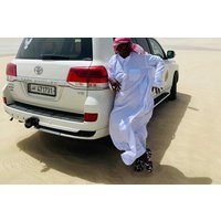 Qatar Desert Adventure Dune Bashing Camel Ride and Falcon photo