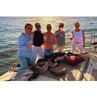 Dolphin Searching Sunset Cruise with Bottle of Cava & Snacks