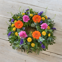 Bright Funeral Wreath | Vibrant Colourful Funeral Tribute Wreath with Carnations Chrysanthemums Germini Statice Eucalyptus