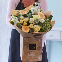 Sympathy hand-tied made with the finest flowers at Interflora Flowers Sympathy hand-tied made with the finest flowers.