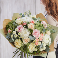Sympathy hand-tied made with the finest flowers at Interflora Flowers Sympathy hand-tied made with the finest flowers.