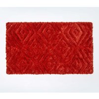 Homescapes Super Absorbent Ikat Pattern Bath Mat in Orange