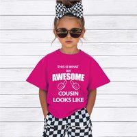 60 SECOND MAKEOVER This Is What An Awesome Cousin Looks Like T-Shirt in Pink | Size: 2-3 Years