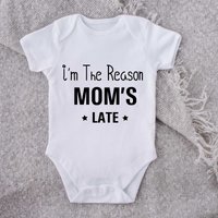 60 SECOND MAKEOVER I'm The Reason Mom's Late Short Sleeve Baby Grow in White | Size: 6-12 m