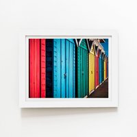 Warren Reed - Designer Coloured Beach Huts Framed Art Print in White | Size: W20" x H30"
