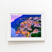 Warren Reed - Designer Postiano At Dusk, Amalfi Coast, Italy Framed Art Print in White | Size: W12" x H16"