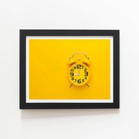 Warren Reed - Designer Yellow Alarm Clock Framed Art Print in Black | Size: W8" x H10"