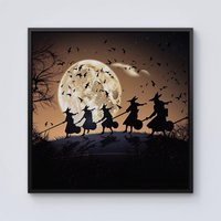 Warren Reed - Designer A Group Of Witches Riding Broomsticks Through The Night Framed Canvas in Black | Size: W30" x H30"