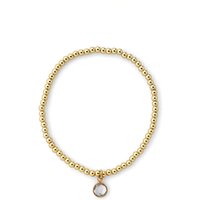 Joy by Corrine Smith Women's April Birthstone Beaded Bracelet Gold Plated in Metallic Gold
