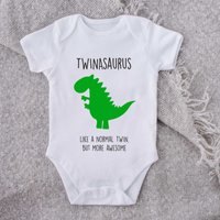 60 SECOND MAKEOVER Twinasaurus Dinosaur Baby Grow in White | Size: 12-18 m